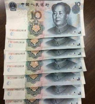 假币制售团伙打印假钞8成能花 验钞机难检测(图)