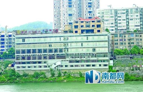 段小文举报的楼顶违建别墅，目前已被拆除。CFP图