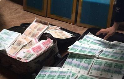 假币制售团伙打印假钞8成能花 验钞机难检测(图)
