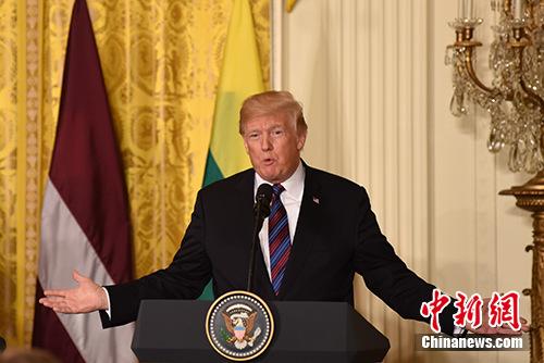 资料图:美国总统特朗普。中新社记者 刁海洋 摄 点击进入下一页